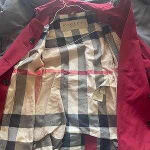 Red Burberry trench coat